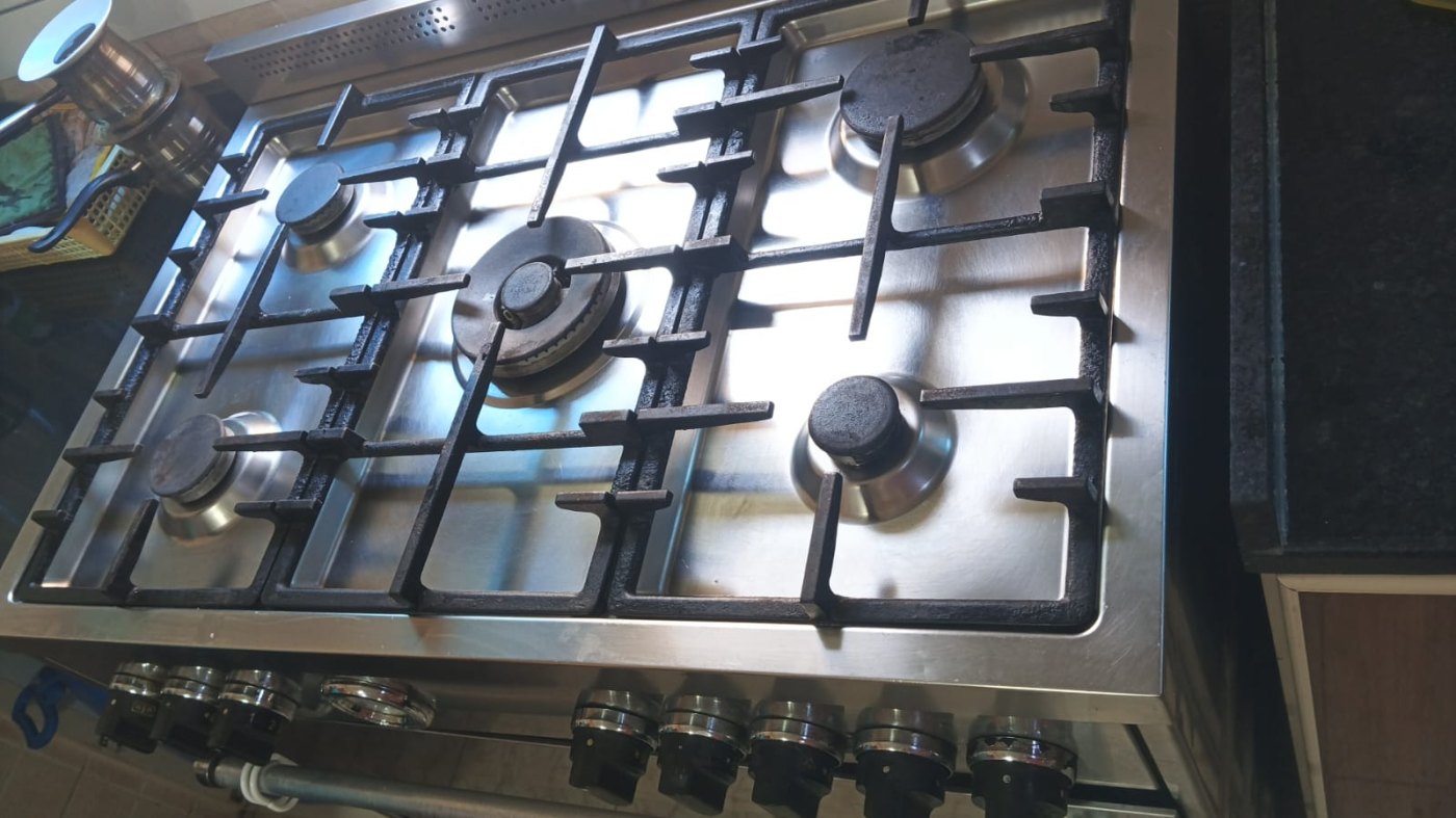 Repairing gas hob burners on a range cooker in Sharjah