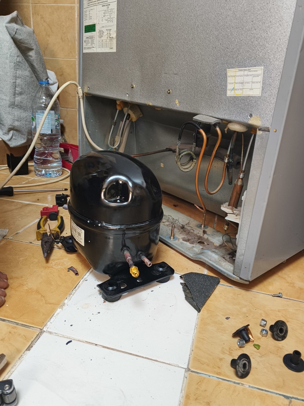 Replacing a refrigerator compressor in Dubai
